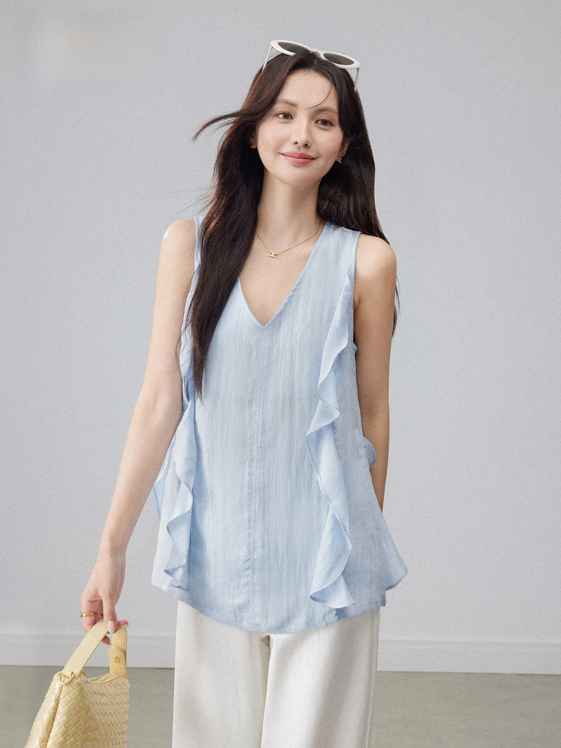 

Blue V-Neck Ruffle Sleeveless Shirt Women's Summer New Design Sense Atmosphere Chenyi Tangkou Wind Korean Version Loose Fit