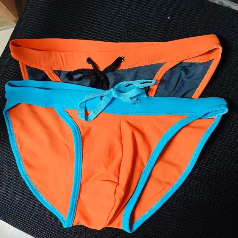 2026UXH European and American men's high-fork triangle swimming trunks fashion color matching simple beach low waist UXH325