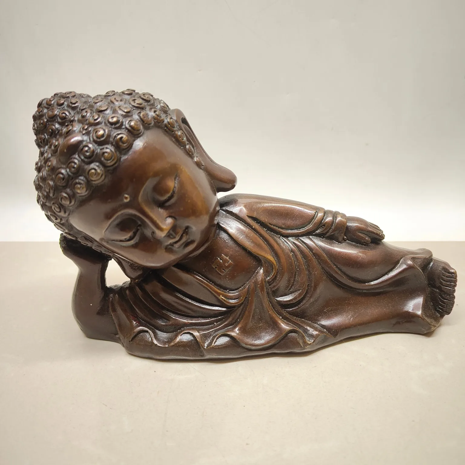 

A sleeping Buddha figurine),Free shipping