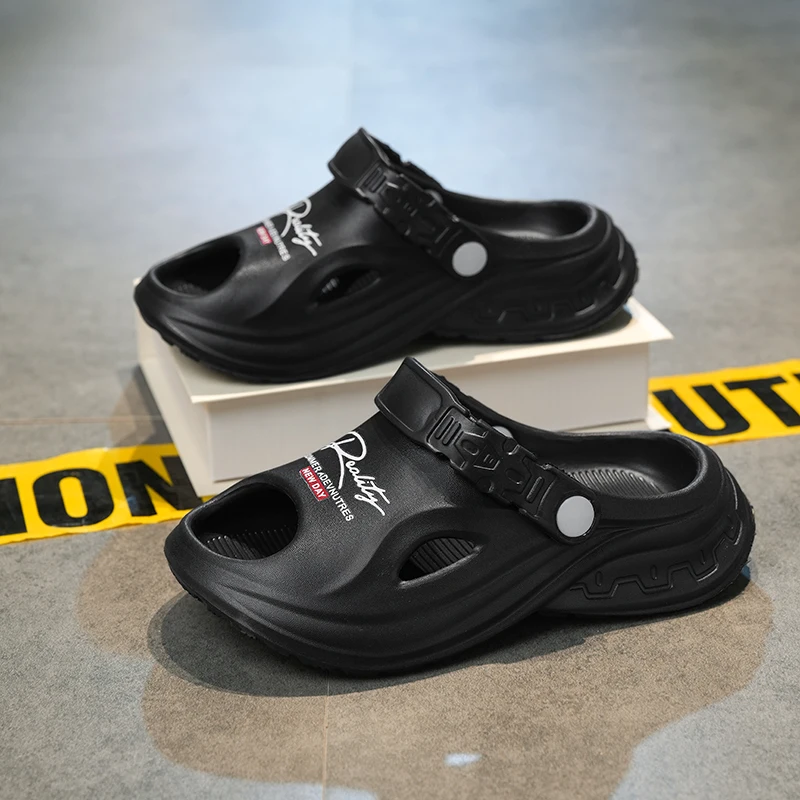 A pair of children's lightweight one-piece EVA open toe slides detachable heel band shock absorbing daily walking shoes LH-K03-1