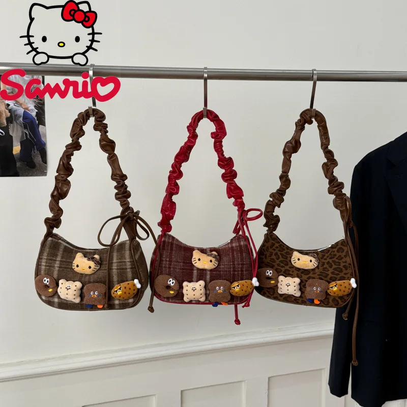 

Hello Kitty 2026 Новая женская сумка, модная высококачественная женская сумка для хранения телефона, универсальная повседневная сумка через плечо с мультяшным принтом для девочек