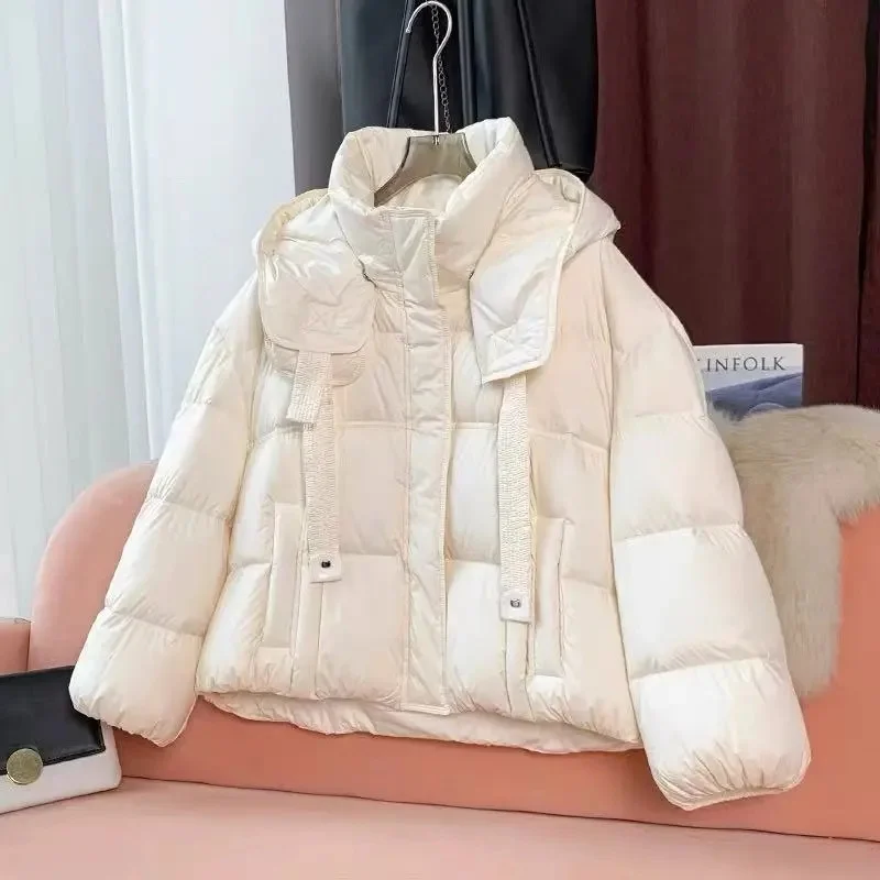 Korte donskatoenen gewatteerde jas damesparka's 2025, winter nieuwe brood met capuchon, warme katoenen jas, Koreaanse dames uitloper tops