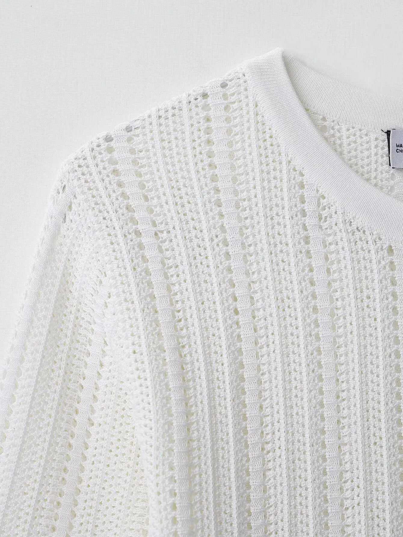 เสื้อโค้ทลำลองผู้หญิง รุ่น BB6522 ZA25 สำหรับฤดูร้อน คอทรงกลม แขนสั้น แต่งเข็มขัด ผ้าถักตาข่ายลาย jacquard รุ่น 0244002