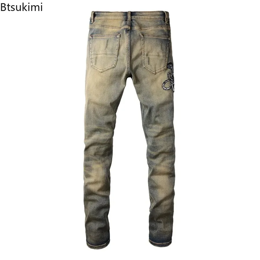 2026 New Men's Fashion Snake Embroidery Denim Jeans Vintage Blue Snakeskin Leather Patch Stretch Pants Skinny Tapered Trousers