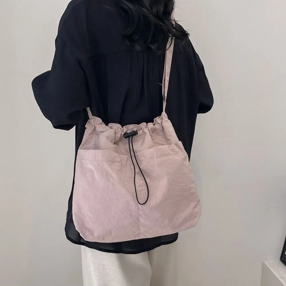 

Solid Color Drawstring Bucket Bag Large Capacity Tote Bag Nylon Shoulder Bag Korean Style Commuting Bag Canvas Crossbody Bag