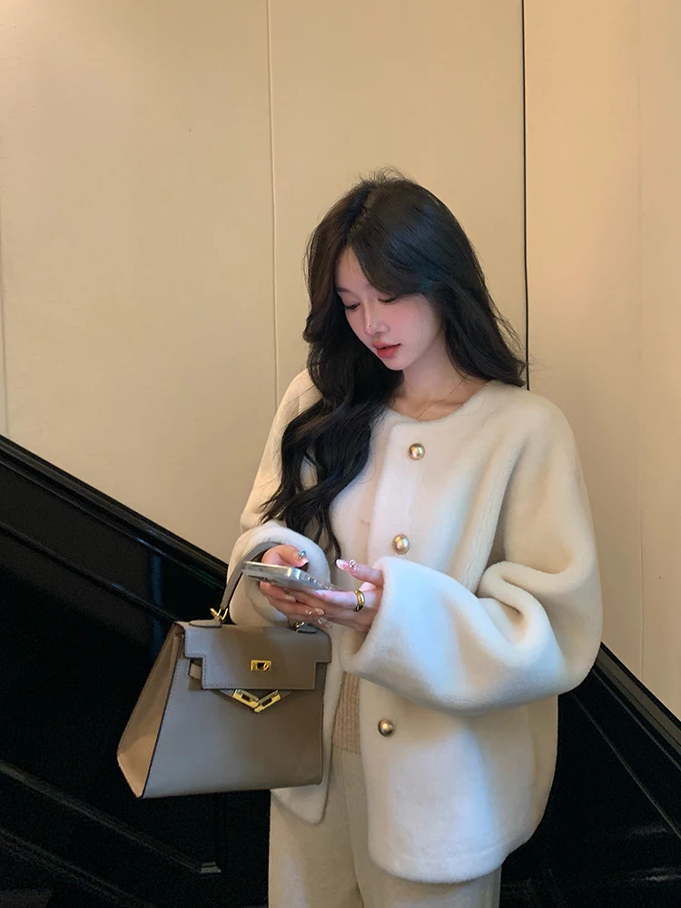 

LM mat Lamb Fur Coat Women's Winter New Sle Inteated Leather And Fur Jaet Long Sve round Ne Loose Fit