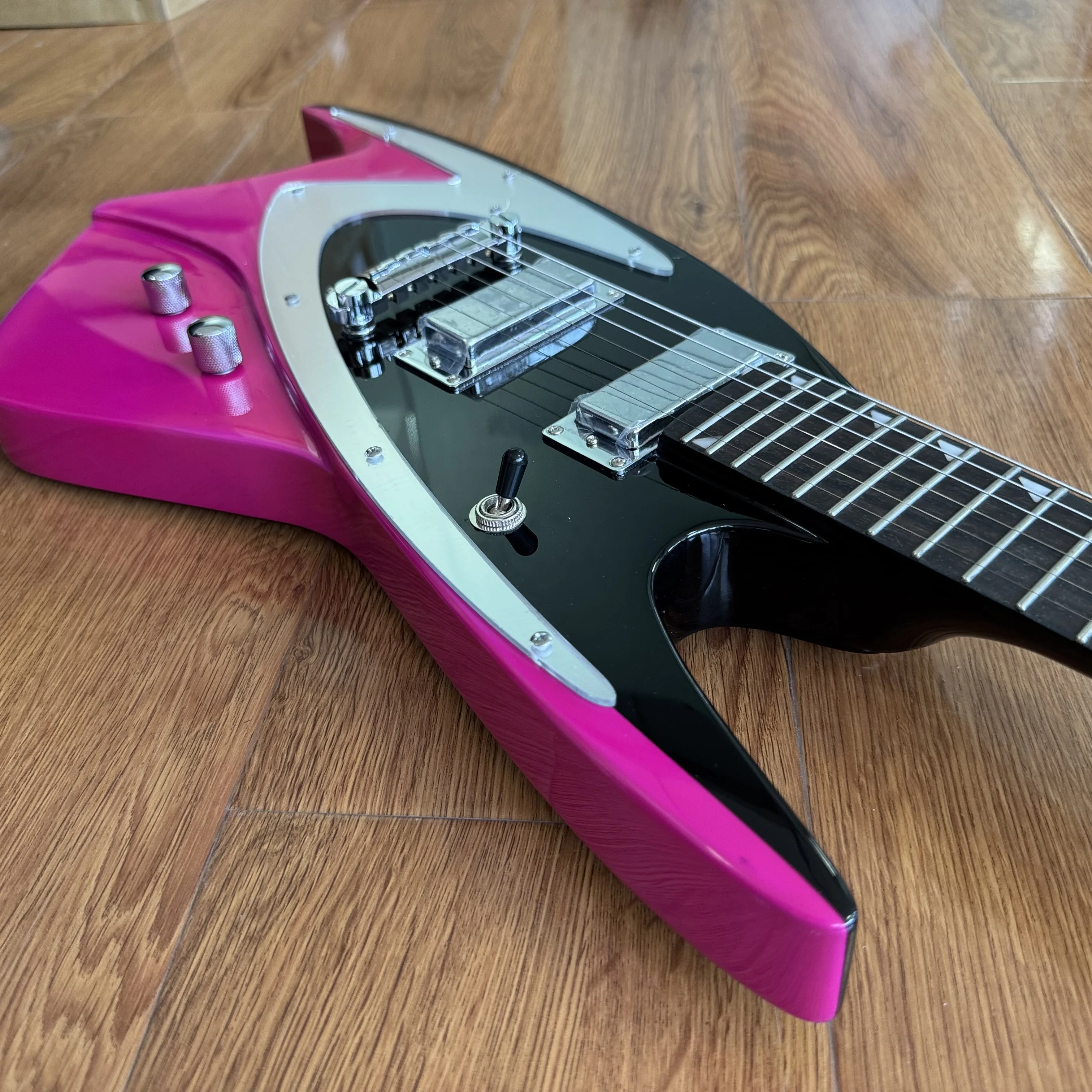 Costom Electric Guitar With A Body In Bright Pink And Black Contrast, Silver Metal Guard Plates, Double-Coil Pickups