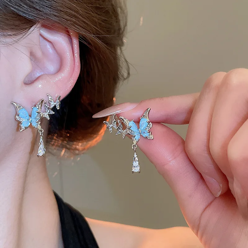

Minar Trendy Blue Color CZ Cubic Zirconia Butterfly Wing Tassel Dangle Earrings for Women Silver Plated Copper Wedding Jewelry