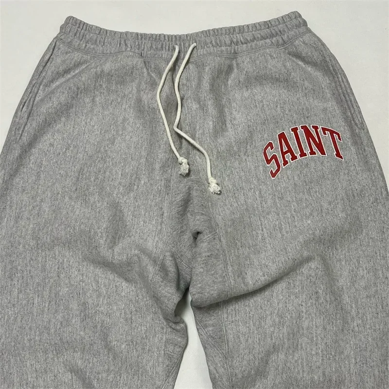 

24ss Grey SAINT MICHAEL Pants Men Women 1:1 Top Quality Cracked Retro Print SAINT LOGO Sweatpants