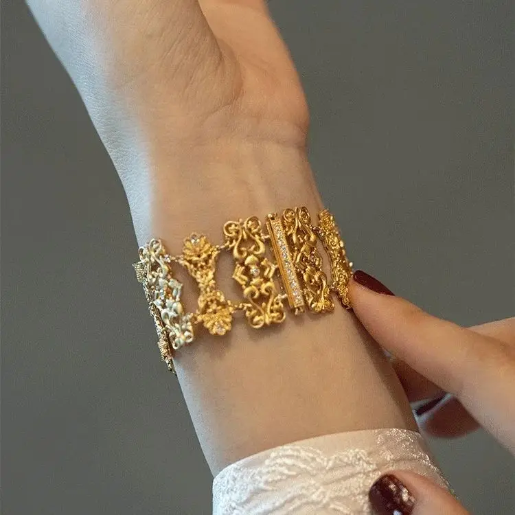 18k gold wide hollowed out design diamond bracelet