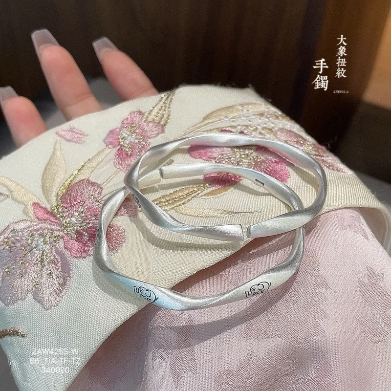 

999.9 Sand Old Laser Elephant Twist Open Mouth Solid Silver Bracelet