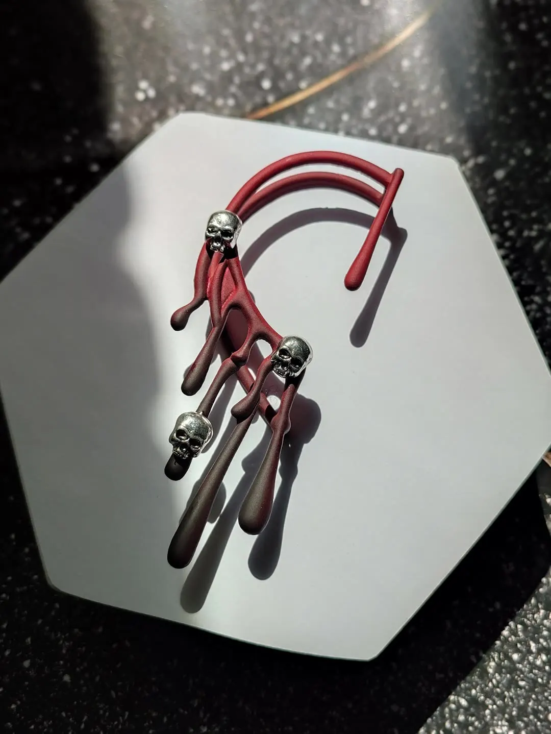 

Halloween-themed ear cuffs with exaggerated lava designs + retro wine red color and minimalist, niche-style earrings.