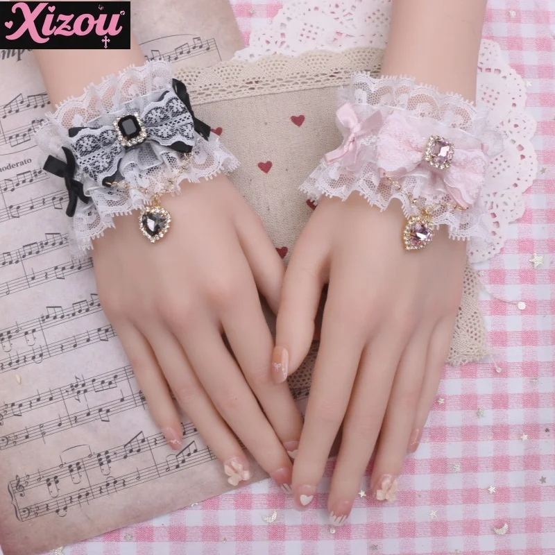 Accessori lolita da donna con fiocco in pizzo dolce e carino fatto a mano giapponese con strass, ciondolo d'amore, braccialetto morbido per ragazza, manica a mano