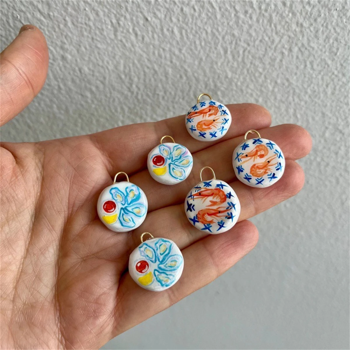 

Stainless steel ocean series pendant accessories, small fish, shrimp, oysters, salted fish jewelry accessories, gold-plated