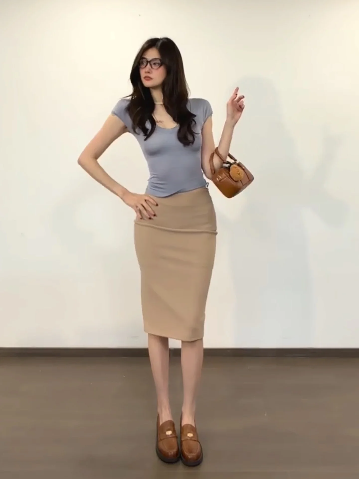 

Raysel Slim Fit V-Neck Short Sleeve Knitted Top And High Waist Skirt Casual Fashion Set for Women Spring Season