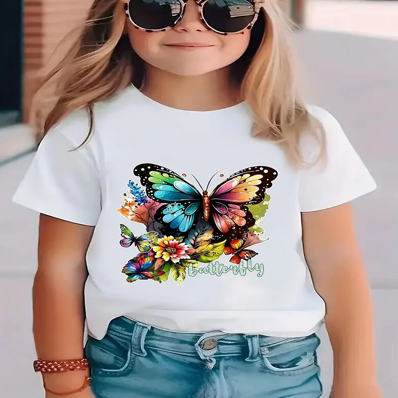 A short-sleeved T-shirt for girls with a butterfly print – a versatile, casual summer outfit perfect for children. The design is