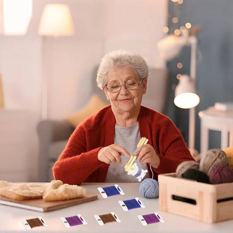 Avvolgitore di corde Carta per filo da ricamo Bobine di filo di plastica Filo interdentale per filo manuale Supporto per stoccaggio rapido Avvolgimento Punto Ferita