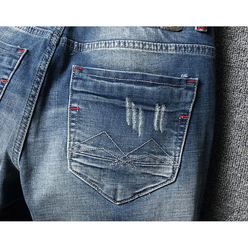 Fashionable street clothing men's stretch jeans retro blue slim fit distressed jeans men's embroidery designer retro denim pants