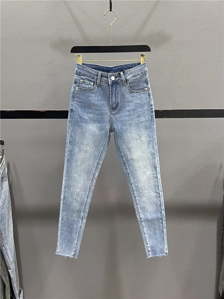 

Retro Washed Denim Pencil Pants Women's Summer 2026 Elastic Slim Fit Distressed Nine Point Small Foot Pants Casual Style