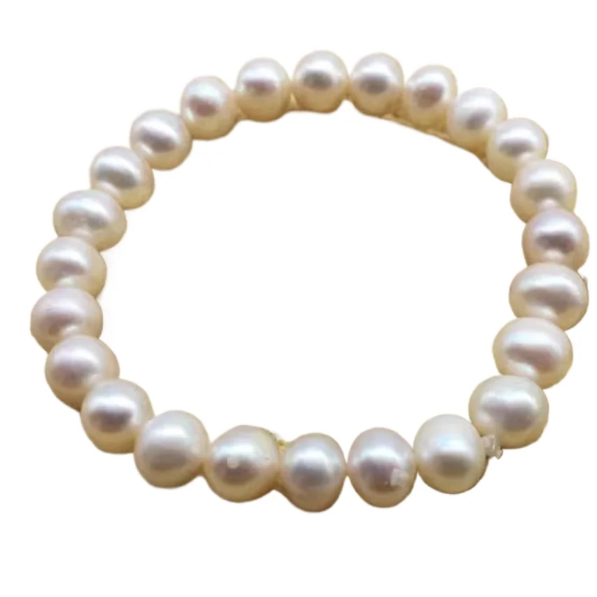 

RARE NATURAL SOUTH SEA WHITE NEAR ROUND PEARL BRACELET