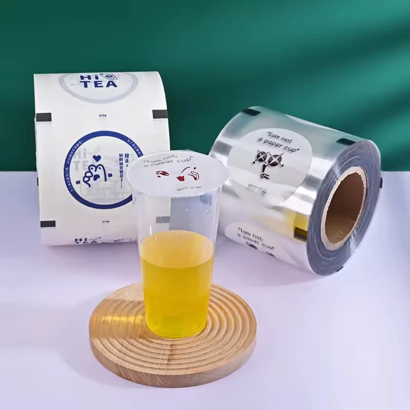 Calibro 90/95 Figura di cartone animato Logo stampato Pellicola sigillante per tazze Tè al latte Tazza di plastica Pellicola sigillante per latte di soia Un rotolo di rilegatura