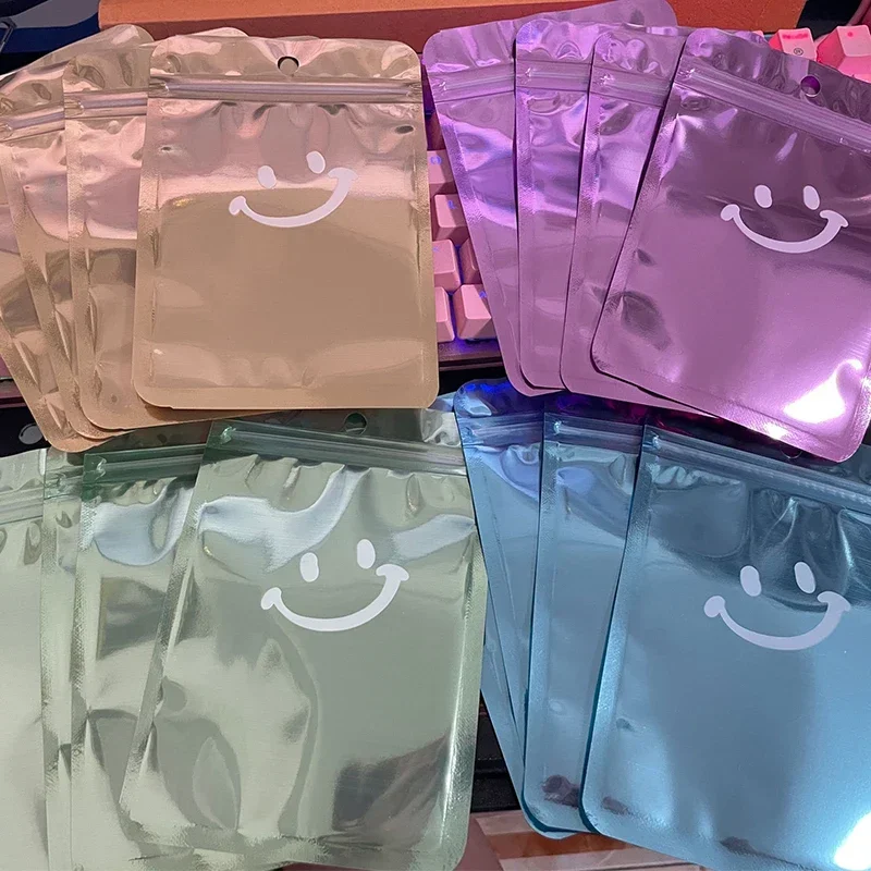 50 bolsas de Mylar, bolsas a prueba de olores con ventana transparente, bolsas holográficas para aperitivos, galletas, joyas, dulces, regalos, bolsas resellables
