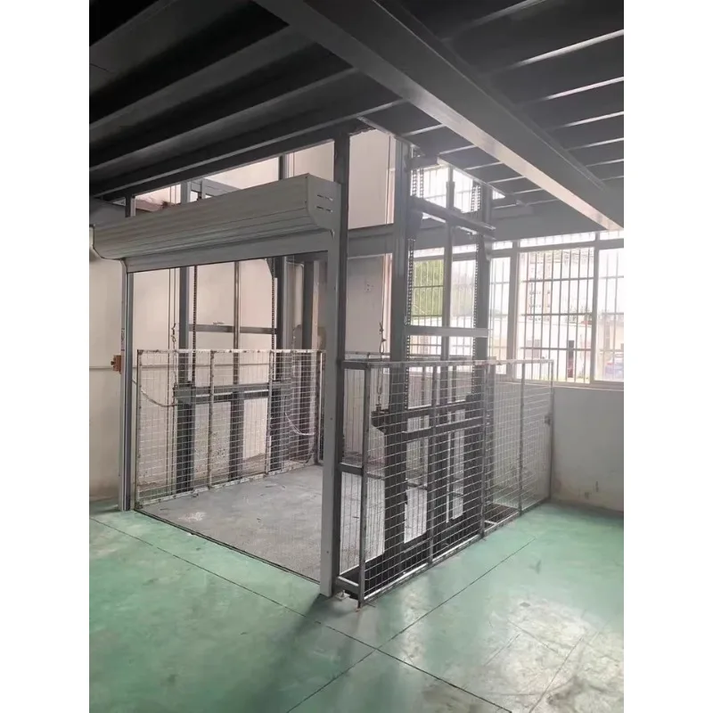 Ascensore di carico idraulico singolo doppio binario personalizzato Carico 500 kg Piattaforma di sollevamento semplice da 1 tonnellata Edificio di magazzino Elettrico