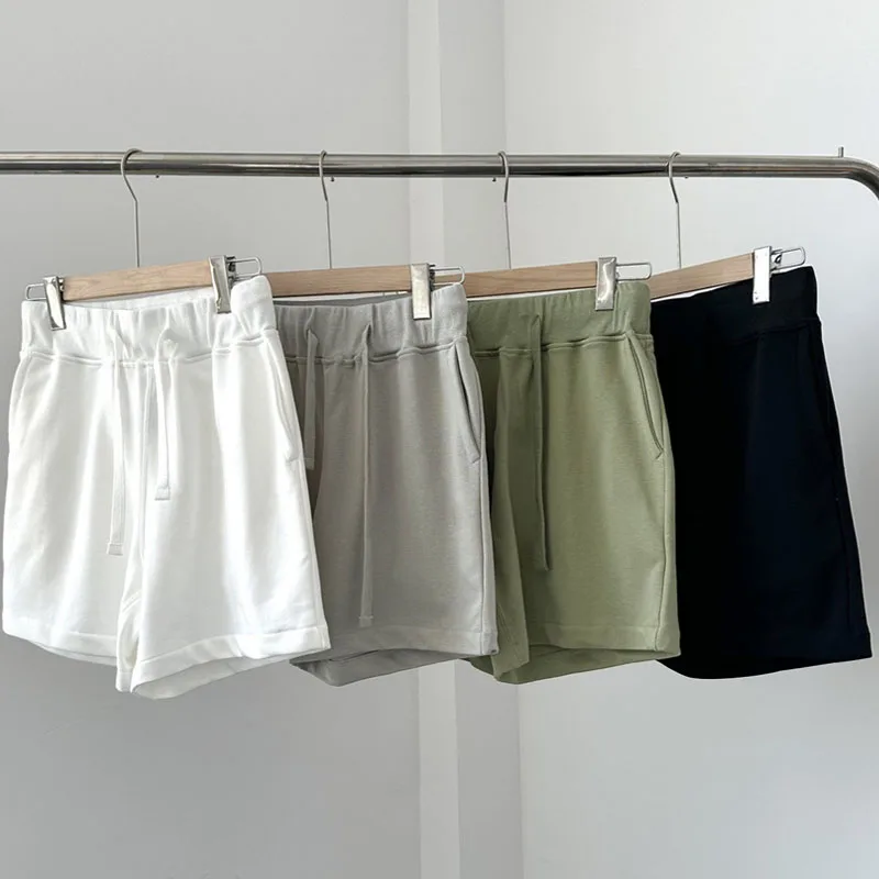 Shorts elásticos meados de origem bordados versáteis, shorts de ângulo plano, calça casual