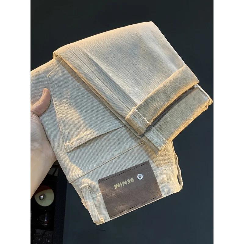 ライスアプリコット色のルーズストレートジーンズ、大きいサイズ、カジュアルでシンプル、2025年秋トレンド、万能パンツ、メンズ快適C