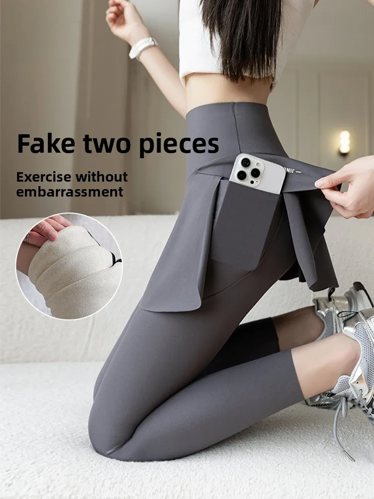 Pantalon de Yoga taille haute pour femmes, jupe Bot amincissante, ajouré, Design de peau d'arche, décontracté, longueur à neuf points