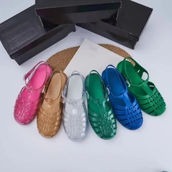 2024 Summer Women's Retro Woven Jelly Shoes Ladies Shiny Flat Heel Hollow Beach Shoes Adult Girls Roman Sandals