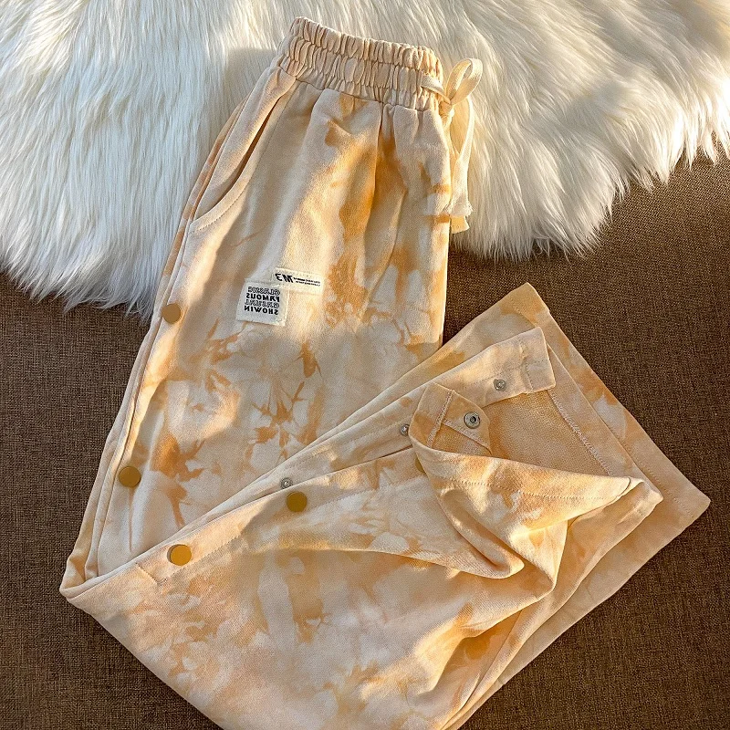 Pantaloni lunghi con stampa Tie Dye donna 2021 pantaloni dritti larghi casuali pantaloni elastici in vita Streetwear con bottoni divisi pantaloni Hip Hop