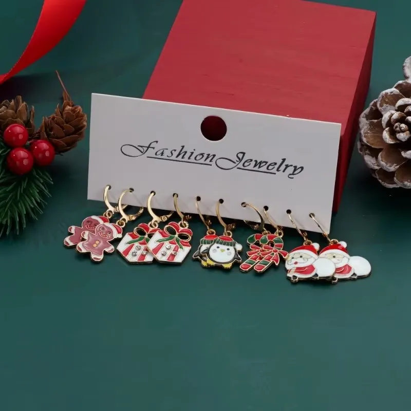 Conjunto de aretes navideños Diseño creativo Papá Noel Muñeco de nieve Copo de nieve Estrellas Pendientes y aretes de árbol de Navidad