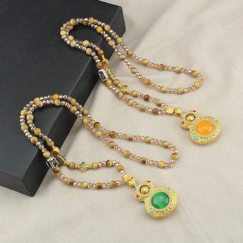 

DIY accessories Ancient French style rotatable gourd pendant necklace female niche high-end imitation crystal beaded sweater cha