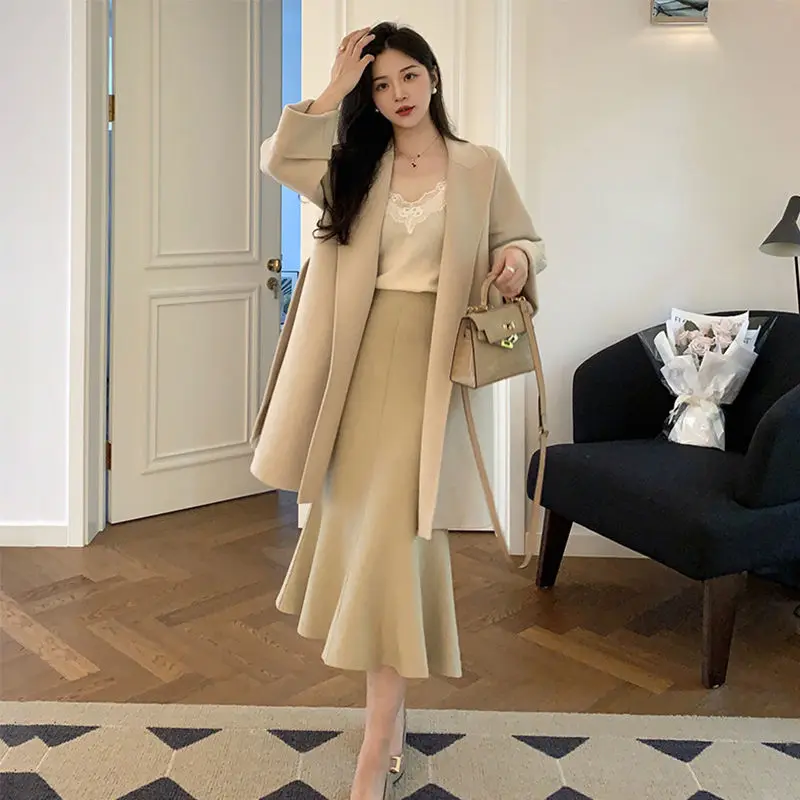 

Нежная темпераментная трикотажная юбка для женщин средней длины грушевидной формы с высокой талией трапециевидной формы «рыбий хвост» юбка с подкладкой на бедрах шерстяная юбка