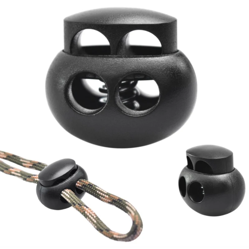 50 Stück langlebige schwarze Federschnurstopper, elastischer Kordelstopper mit zwei Löchern, PC-Material, Reißverschlussclip