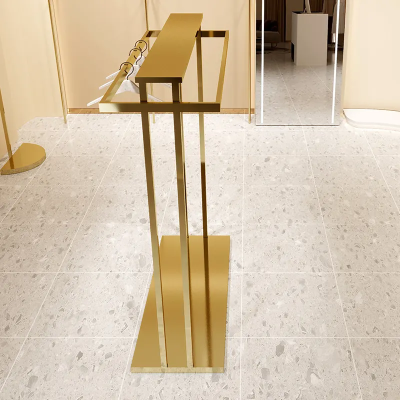 

Стеллаж для демонстрации одежды с двойными рядами вешалок из нержавеющей стали и титана в центре, для женской одежды