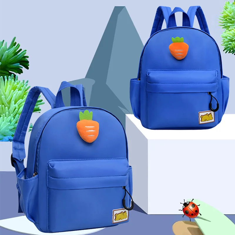 Mochila de estilo Simple para niños, bolso escolar ligero de nailon, resistente al agua, de colores sólidos, para guardería y viajes