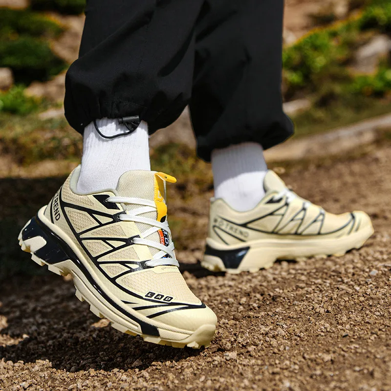 Sepatu mendaki merek bergaya untuk pria wanita warna Khaki putih sepatu mendaki gunung antiselip sepatu jalan hutan Trekking uniseks