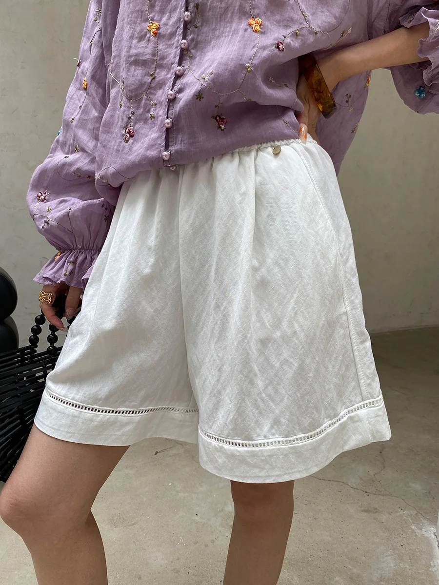 Sommerliche Damen-Shorts in unifarbenem Design mit hohler Textur, elastischem, hohem Bund, schlank machendem und lockerem, weitem Bein. – Detail 27