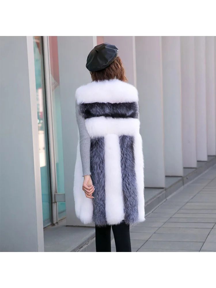 Frans prachtig namaakbontvest zwart wit grijs gestreept gesplitst eenvoudig comfortabel pluizig zacht zacht lang mouwloos bovenkleding