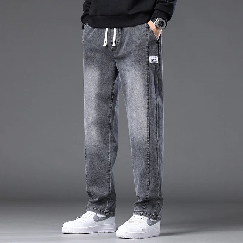 الخريف الشتاء الأزرق الجينز الرجال الرباط مرونة الخصر القطن البضائع الدنيم السراويل العمل موضة السراويل السميكة الذكور حجم كبير M-4XL