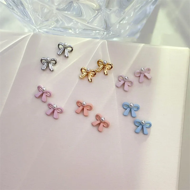 

Silver/Pink/Gold 3D Aolly Bowtie Nail Decorations Bow Pearl Nail Charms Korea Metal Ribbon Nail Jewelry Rhinestones Kawaii