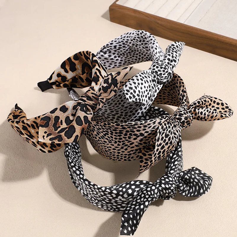 1 Stück koreanische Version Haarband mit Leopardenmuster und Schleife, Retro-Haarband mit Zähnen, breiter Rand, rutschfest, zum Waschen von Gesicht und Haaren, weiblich
