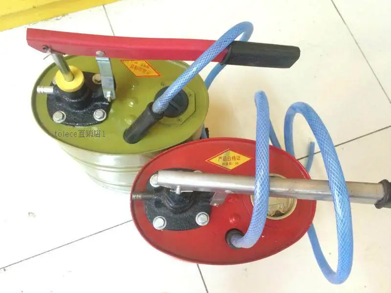 Oil can, hand cranked oil dispenser, gearbox oil, gear oil dispenser