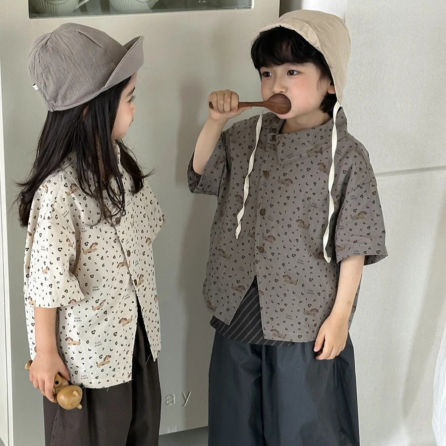 Shirt 2026 Spring and Summer New Childrens Clothing Boys and Girls Irregular Inclined Door Flap Cartoon Leopard Print Shirt