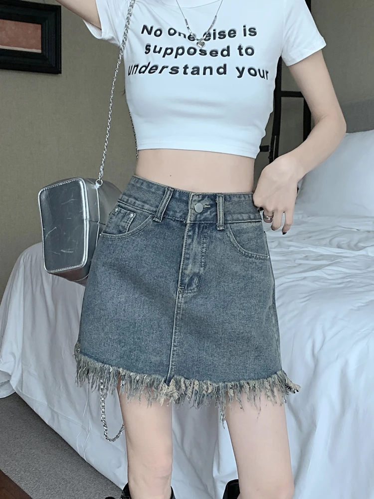 Gonna a trapezio a vita alta Gonne di jeans da donna Primavera Autunno Nuovo design Gonne coreane Sle ort con frange dimagranti