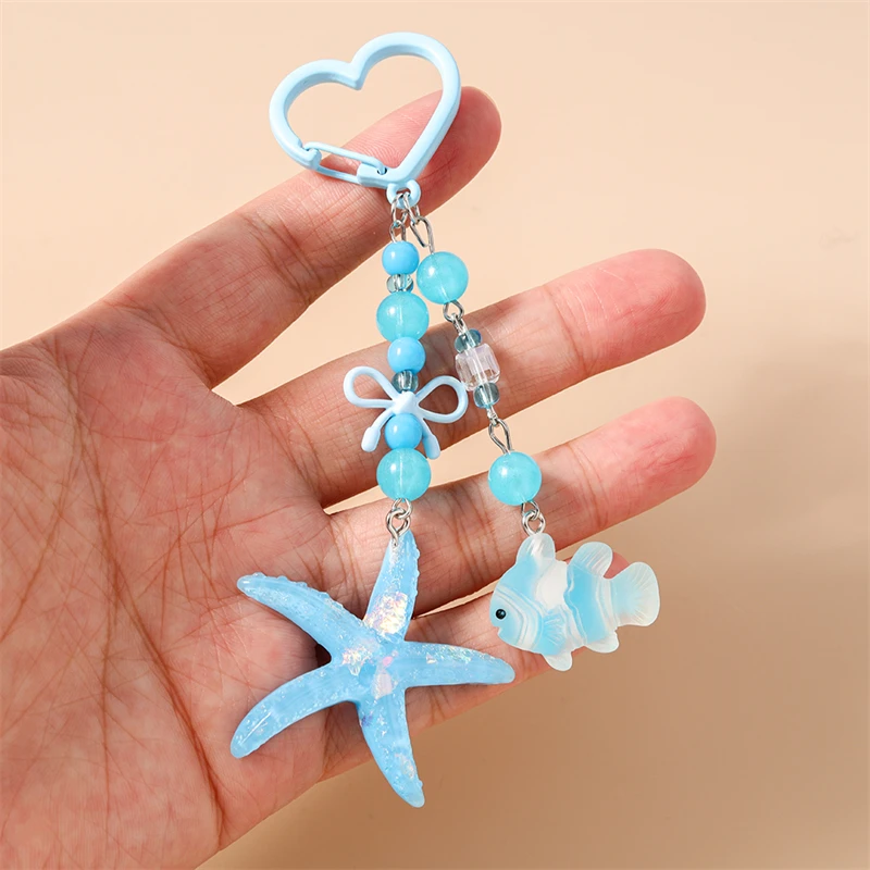 Niedliche handgefertigte Perlen-Schlüsselanhänger, Sommer-Strand-Sternfisch-Muschel-Anhänger, Schlüsselringe für Damen und Herren, Autoschlüssel, Handtaschen-Schlüsselanhänger, DIY-Geschenke – Detail 26