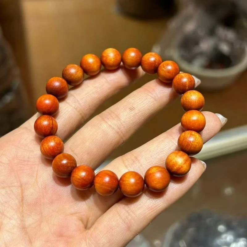 

Natural high-quality Indonesian imperial blood dragon wood bracelet for men and women, 10mm translucent beads, versatile DIY han