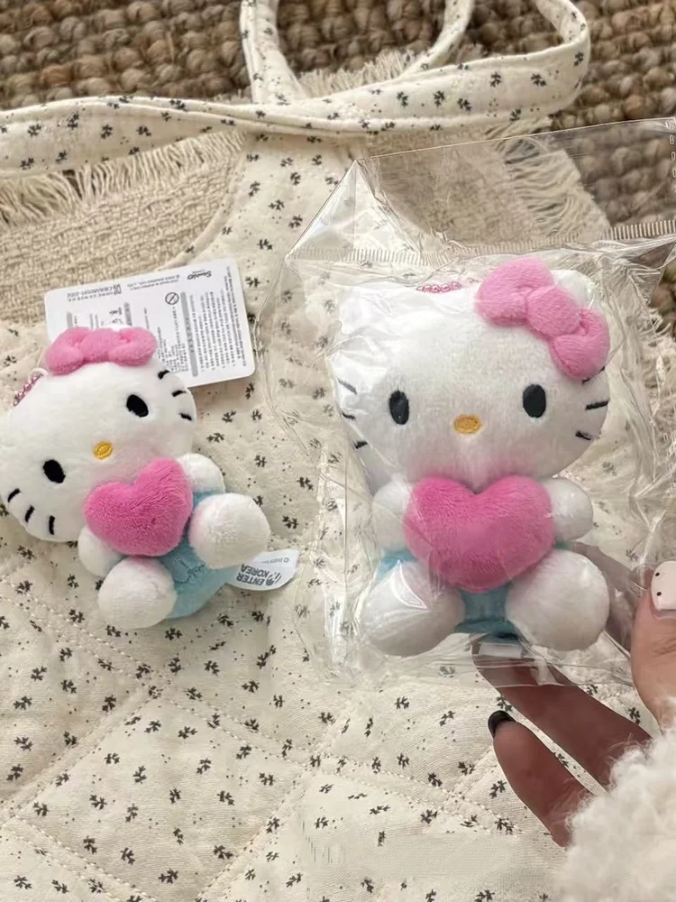 Sanrio Hello Kitty Cross-Dressing Sitting Posture Embrace Love Modeling Plush Keychain Backpack Pendant Car Key Decoration Gift